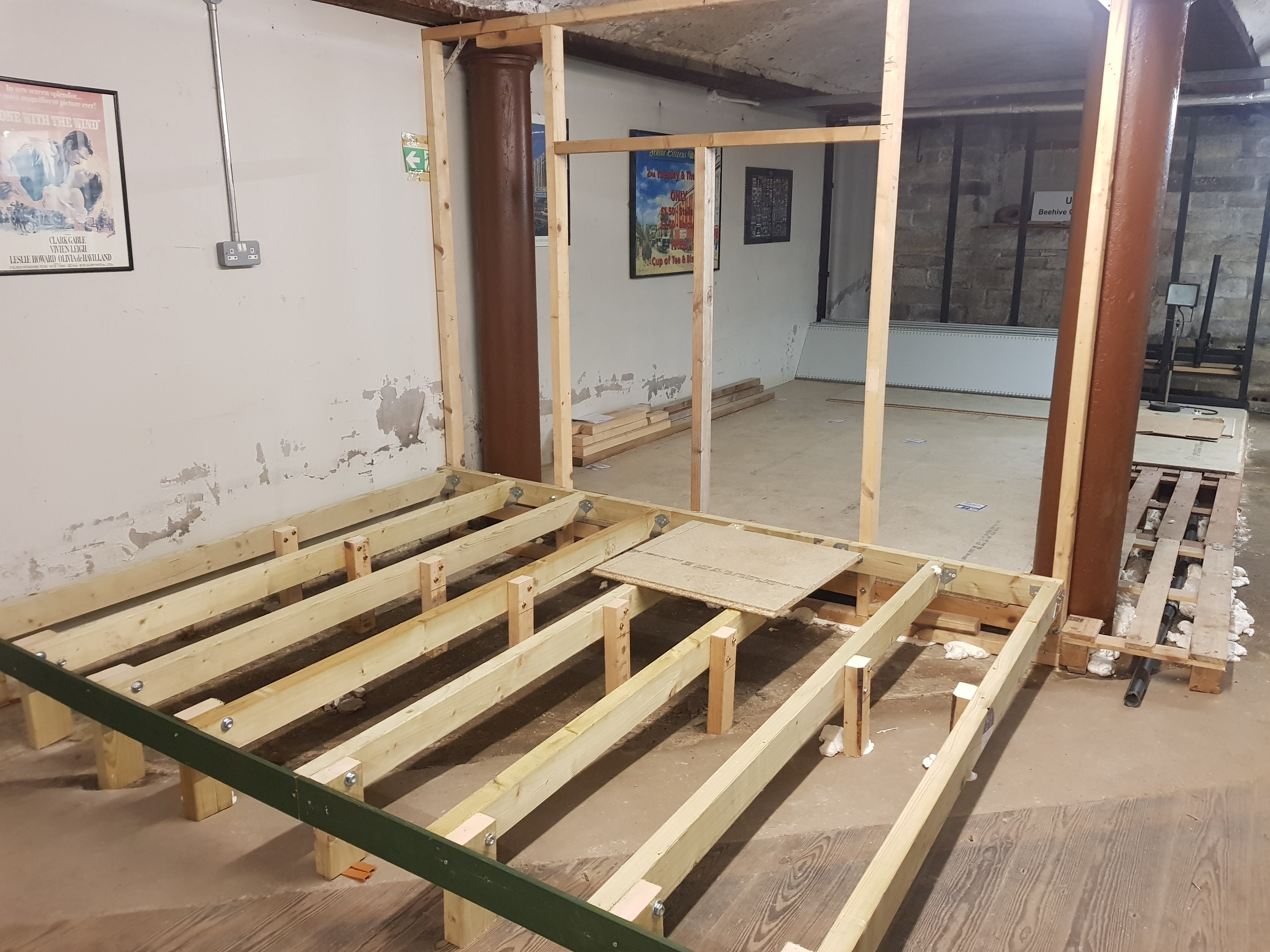 Floor joists attached to studs on the floor