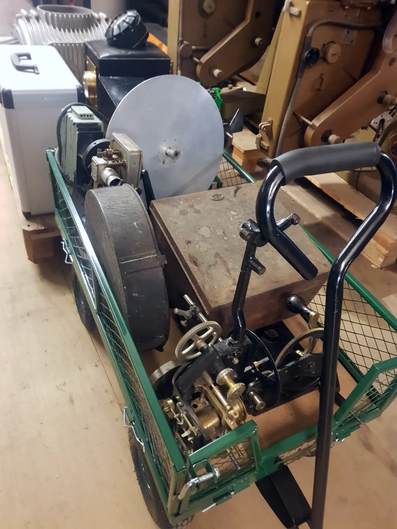 A mesh cart filled with cinema equipment