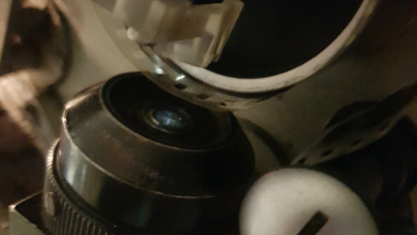 Close up of a sound exciter lamp and Dolby cell on a projector